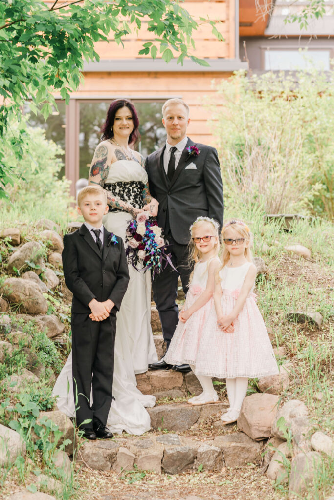 Wedding Family photo at Edmonton Yorath House with two girls, a boy and a man and woman