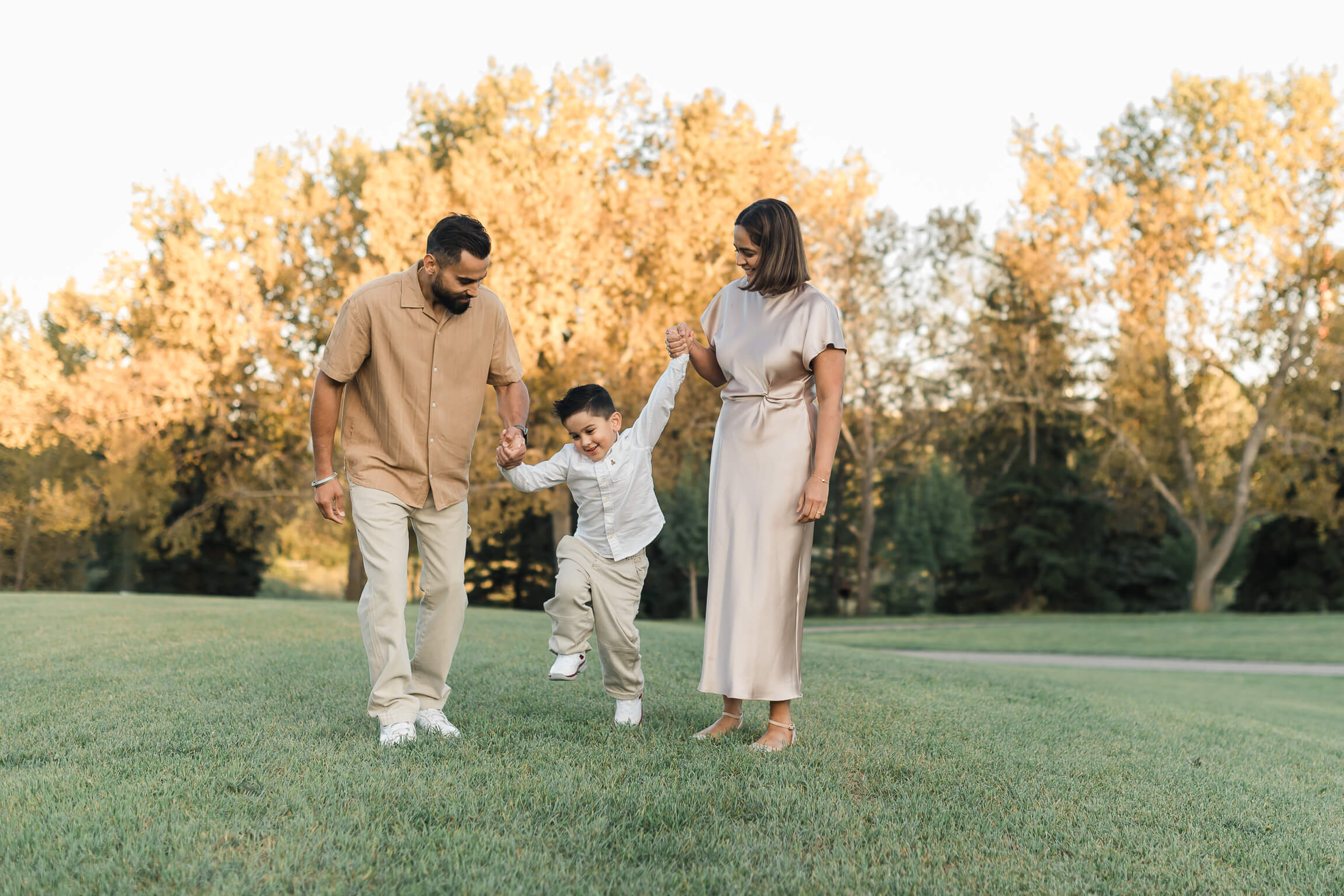 An Edmonton family having fun during early autumn before going to an Edmonton indoor playground