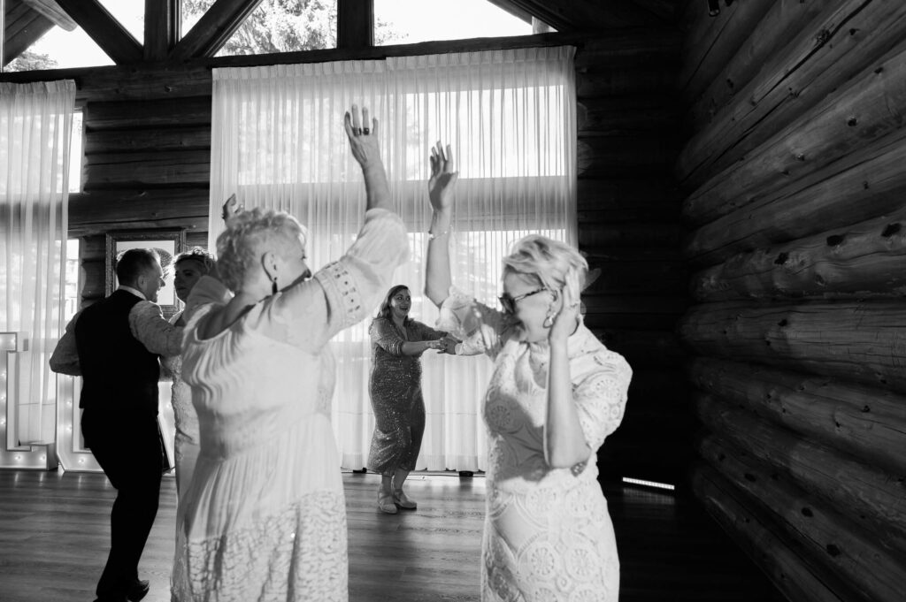 a group of women dancing in a room